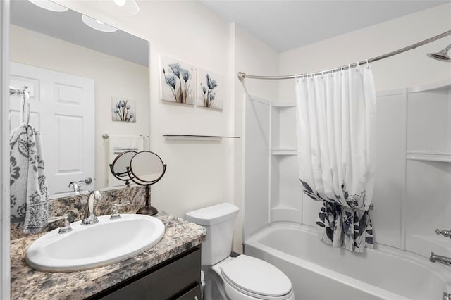 full bathroom featuring vanity, toilet, and shower / bath combo with shower curtain