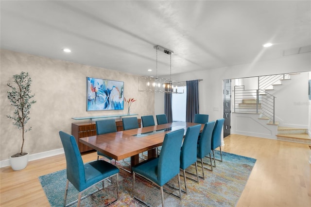 dining area featuring light wood-type flooring