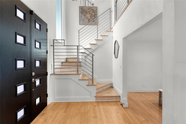 entrance foyer with light wood-type flooring