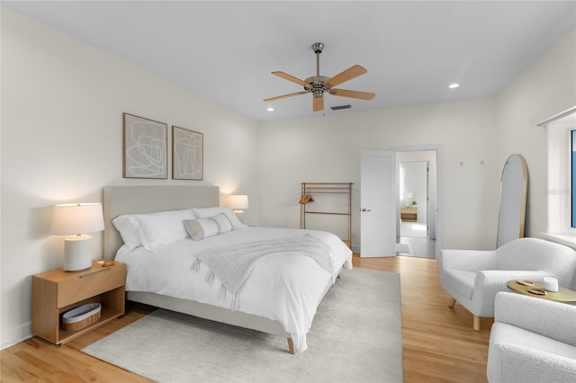 bedroom featuring ceiling fan and light wood-type flooring