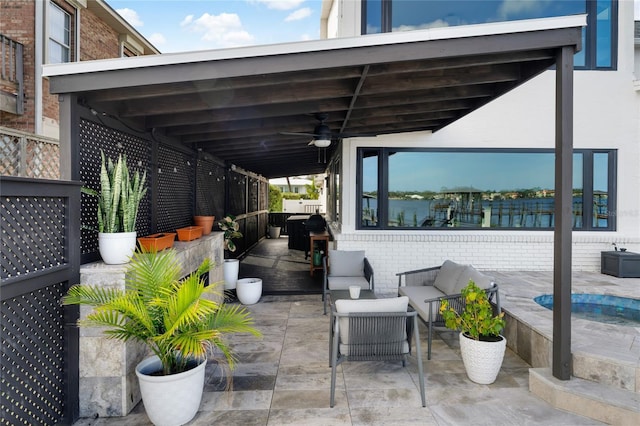 view of patio with a grill, an outdoor hangout area, and ceiling fan