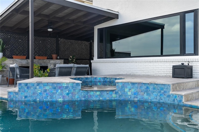 view of swimming pool with a patio area and an outdoor bar