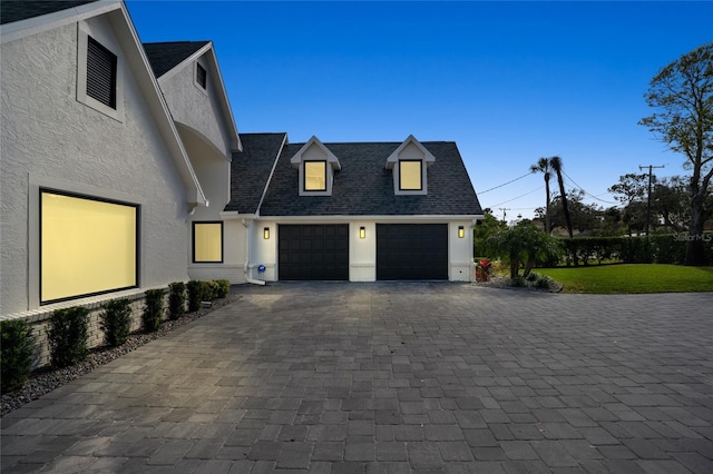 view of front of home with a garage