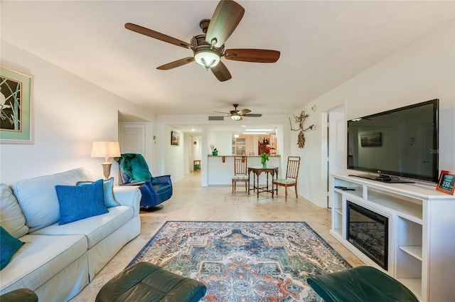 living room with light tile patterned flooring