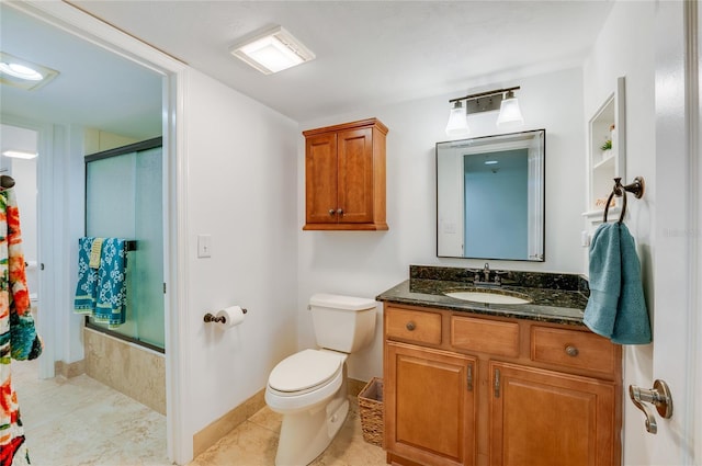 full bathroom with vanity, tile patterned floors, shower / bath combination with glass door, and toilet