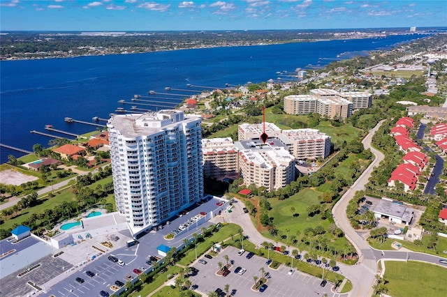 drone / aerial view with a water view