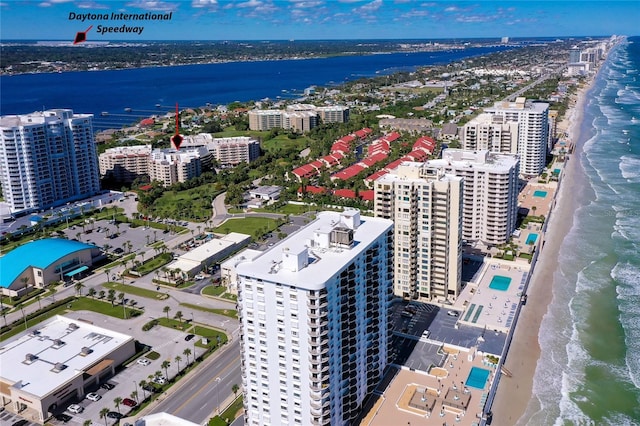 aerial view featuring a water view and a beach view