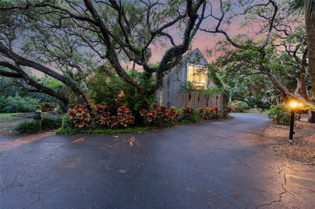 view of property exterior at dusk