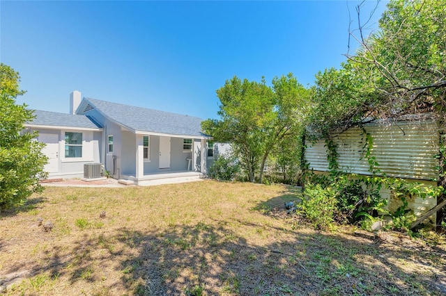 408 Wisteria Rd, Daytona Beach, FL 32118 - view of yard with central AC unit and a patio