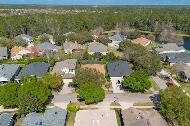 birds eye view of property with a residential view