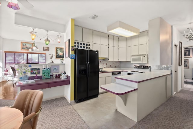 kitchen with sink, dishwashing machine, hanging light fixtures, black refrigerator with ice dispenser, and electric stove