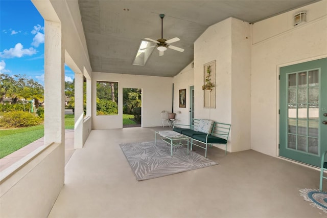 view of patio with ceiling fan