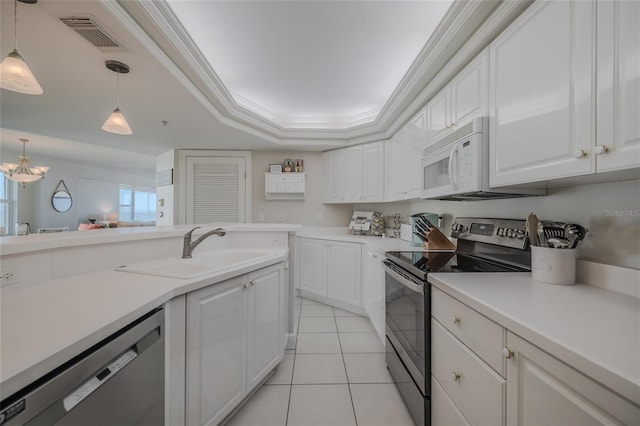 kitchen featuring stainless steel appliances, crown molding, sink, and white cabinets