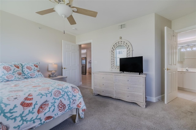 carpeted bedroom with ceiling fan