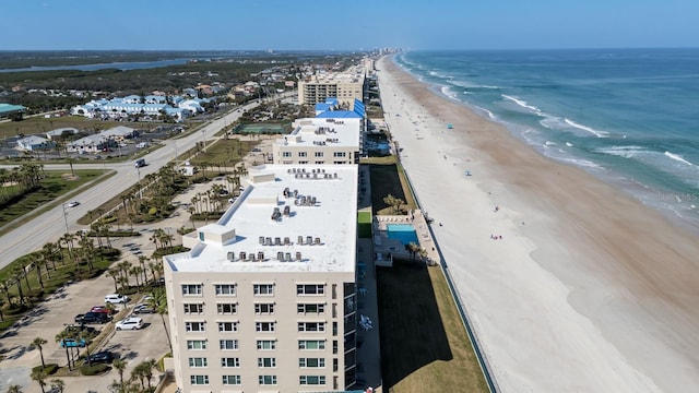 aerial view featuring a beach view and a water view