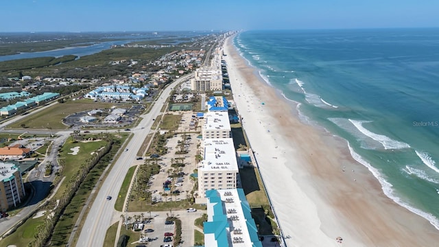 aerial view featuring a beach view and a water view