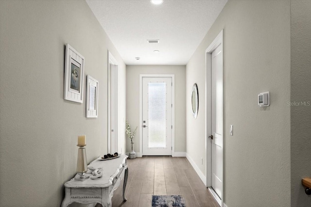 doorway featuring light wood-type flooring