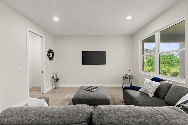 72 Aurora Ave, Ponce Inlet, FL 32127 - living area featuring recessed lighting, light wood-style flooring, and baseboards
