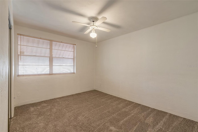 unfurnished room featuring carpet floors and ceiling fan