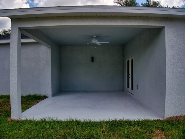 view of patio featuring french doors and ceiling fan