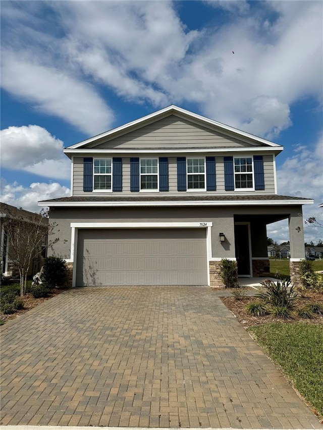 view of front of home featuring a garage