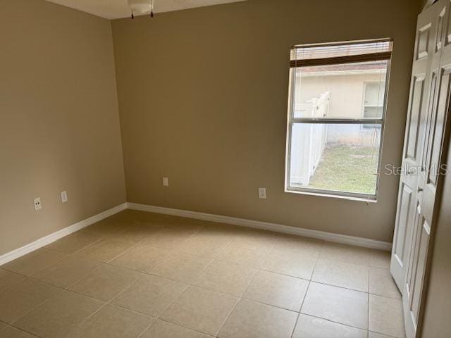 view of tiled spare room