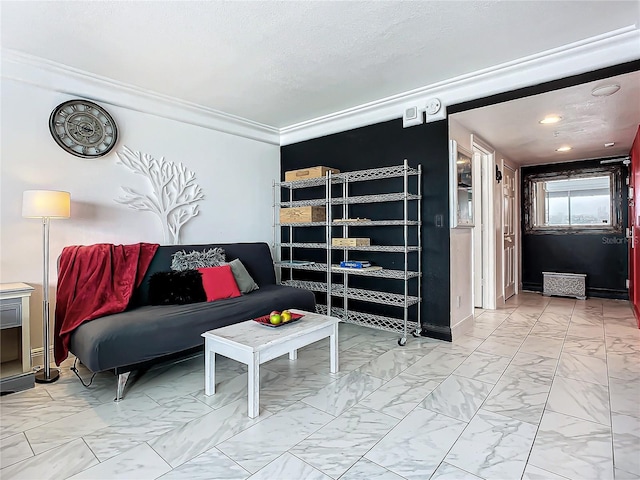 living room featuring ornamental molding and a textured ceiling