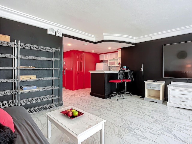 interior space with sink and a textured ceiling