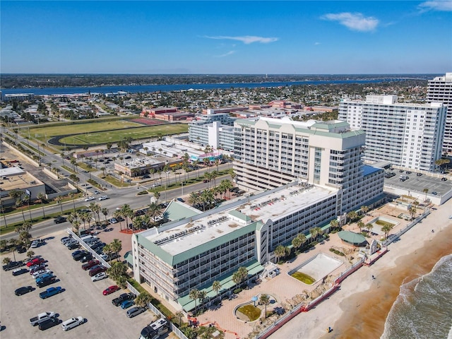 bird's eye view with a beach view and a water view