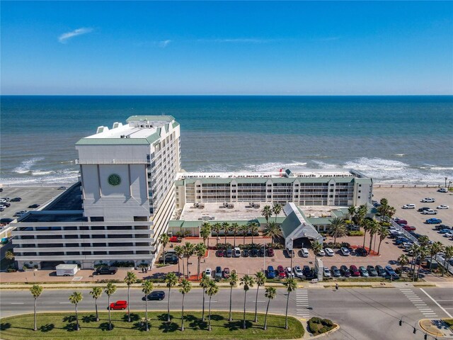 bird's eye view with a water view and a view of the beach