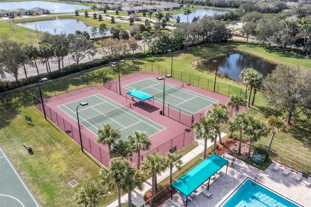 drone / aerial view featuring a water view