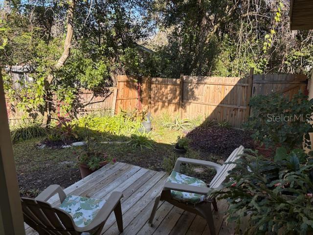 view of yard featuring a wooden deck