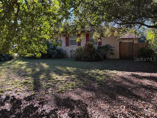 view of property exterior featuring a yard