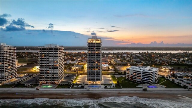 property's view of city with a water view