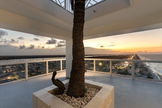 balcony at dusk with a water view