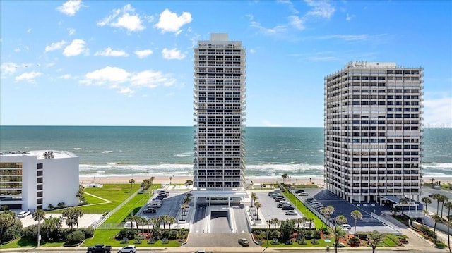 view of water feature with a beach view