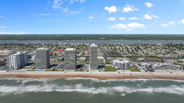 aerial view with a beach view and a water view