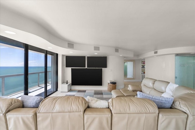 living room featuring a water view