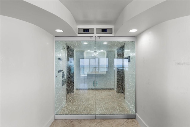 bathroom with tile patterned floors