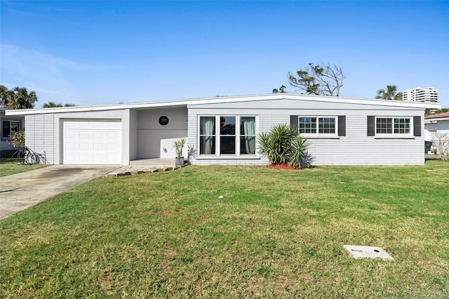 ranch-style house with a garage and a front yard