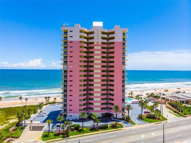 property view of water featuring a beach view