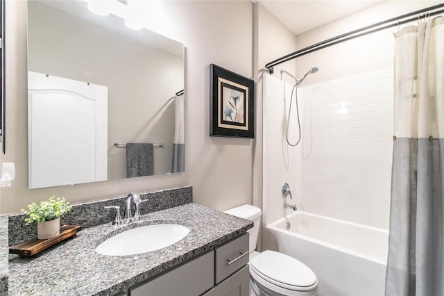 full bathroom featuring toilet, vanity, and shower / bath combination with curtain