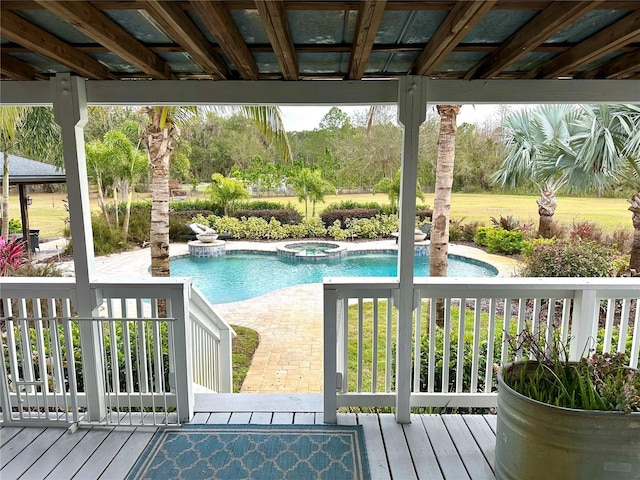 pool with an in ground hot tub