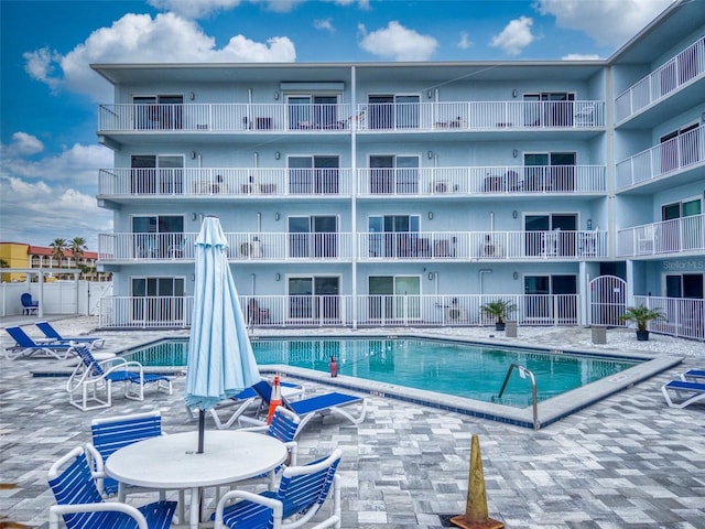 view of pool featuring a patio area