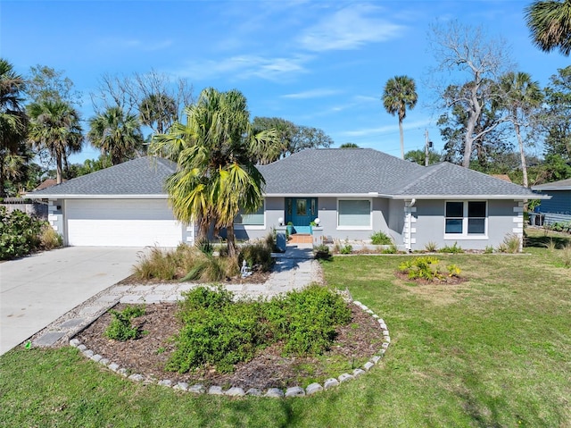 ranch-style house featuring a garage and a front lawn