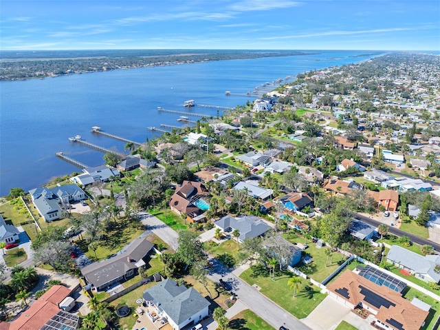 drone / aerial view with a water view