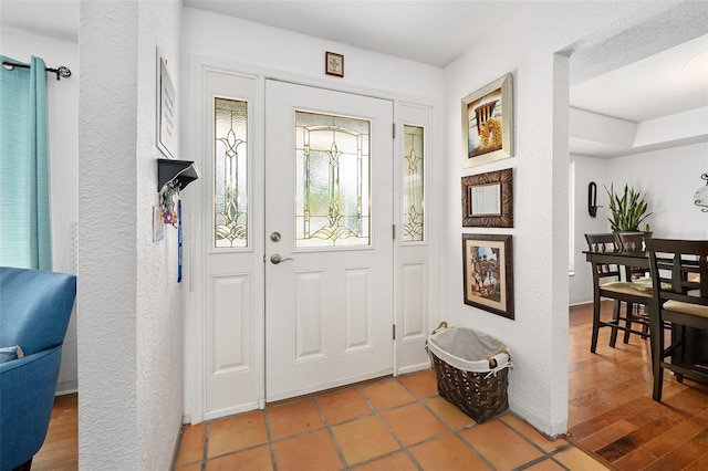 foyer entrance featuring light hardwood / wood-style flooring