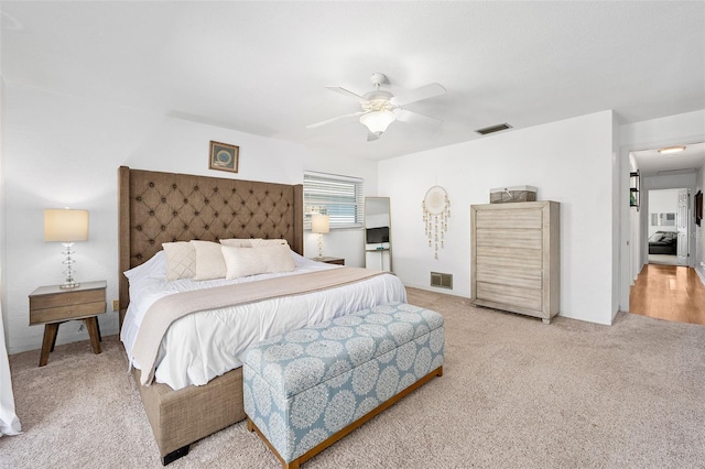 bedroom featuring ceiling fan and carpet flooring