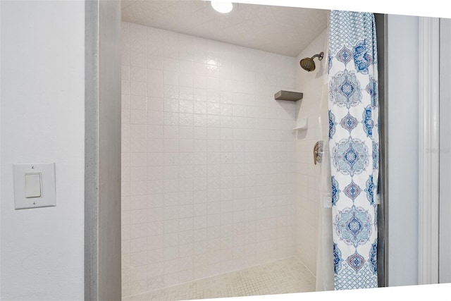 bathroom featuring walk in shower