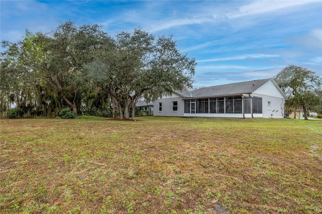 view of yard featuring a sunroom